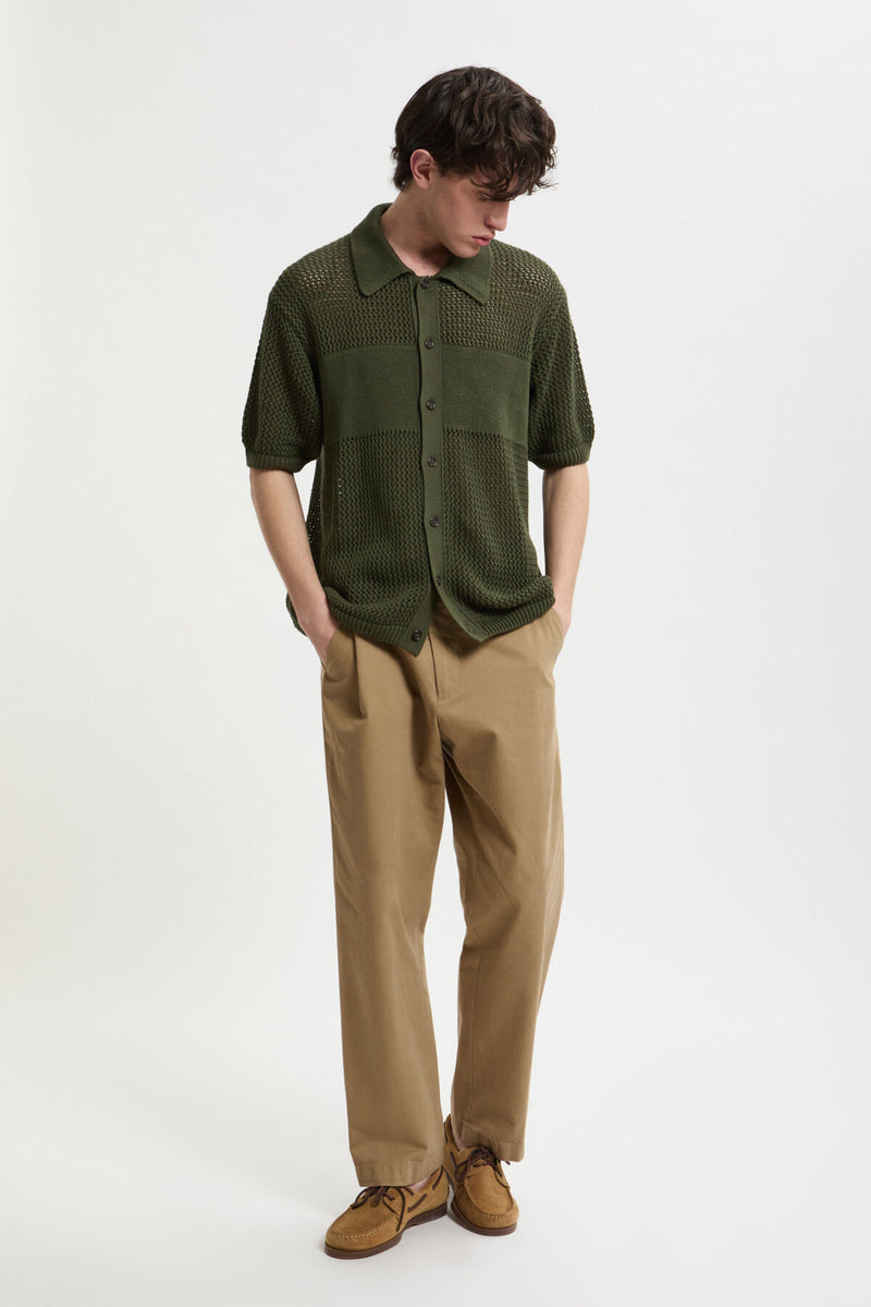 Green perforated knit shirt