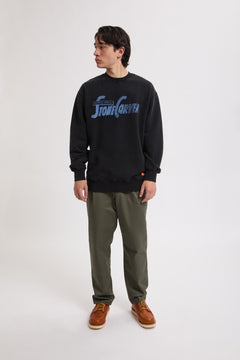 Pantaloni in twill con pinces e gamba affusolata