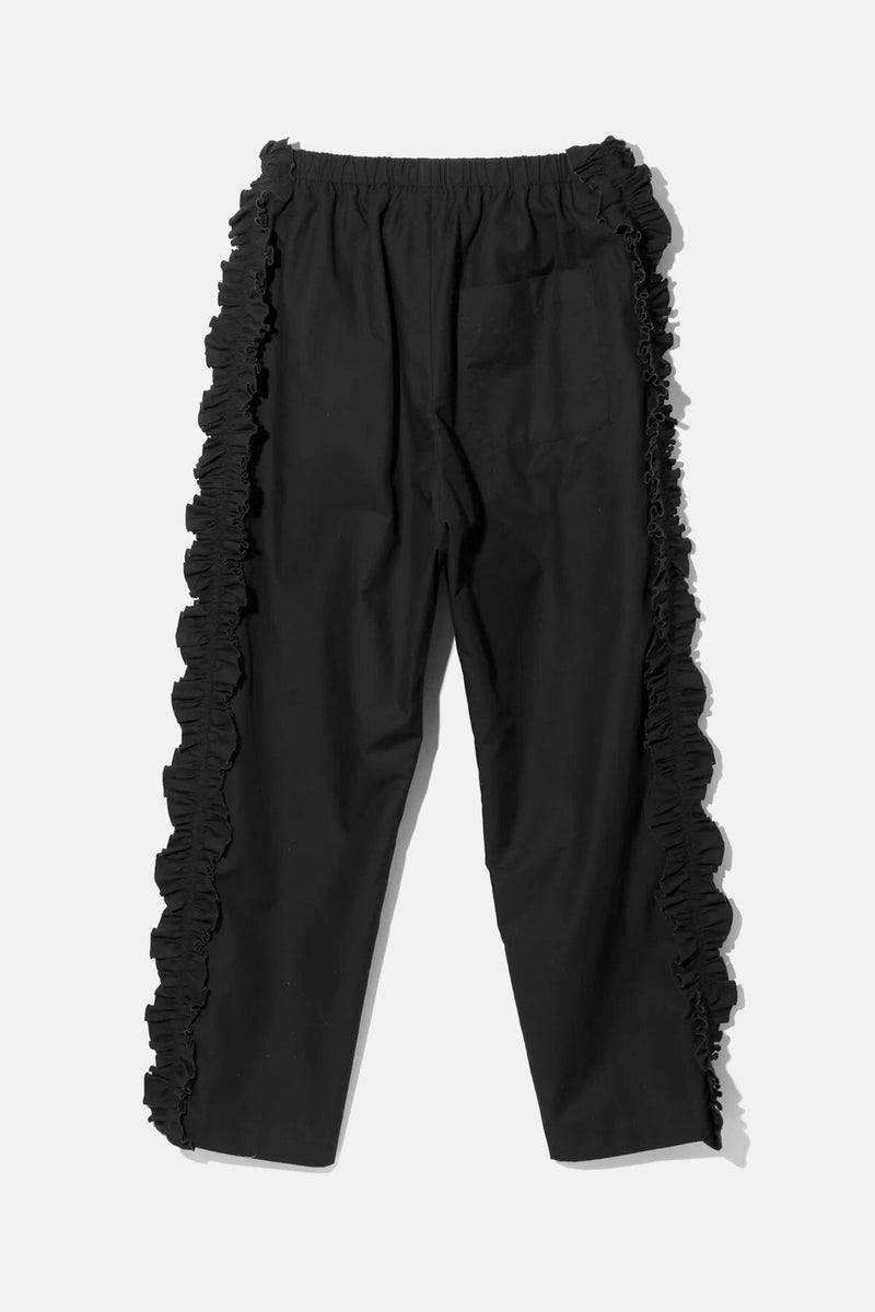 Pantaloni con bande laterali a balze.